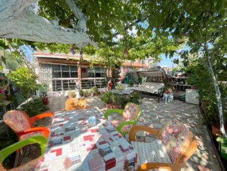 2 1 Wohnung Zum Verkauf In Ürkmez Mit 350Mt Garten Zum Meer Im Zentrum