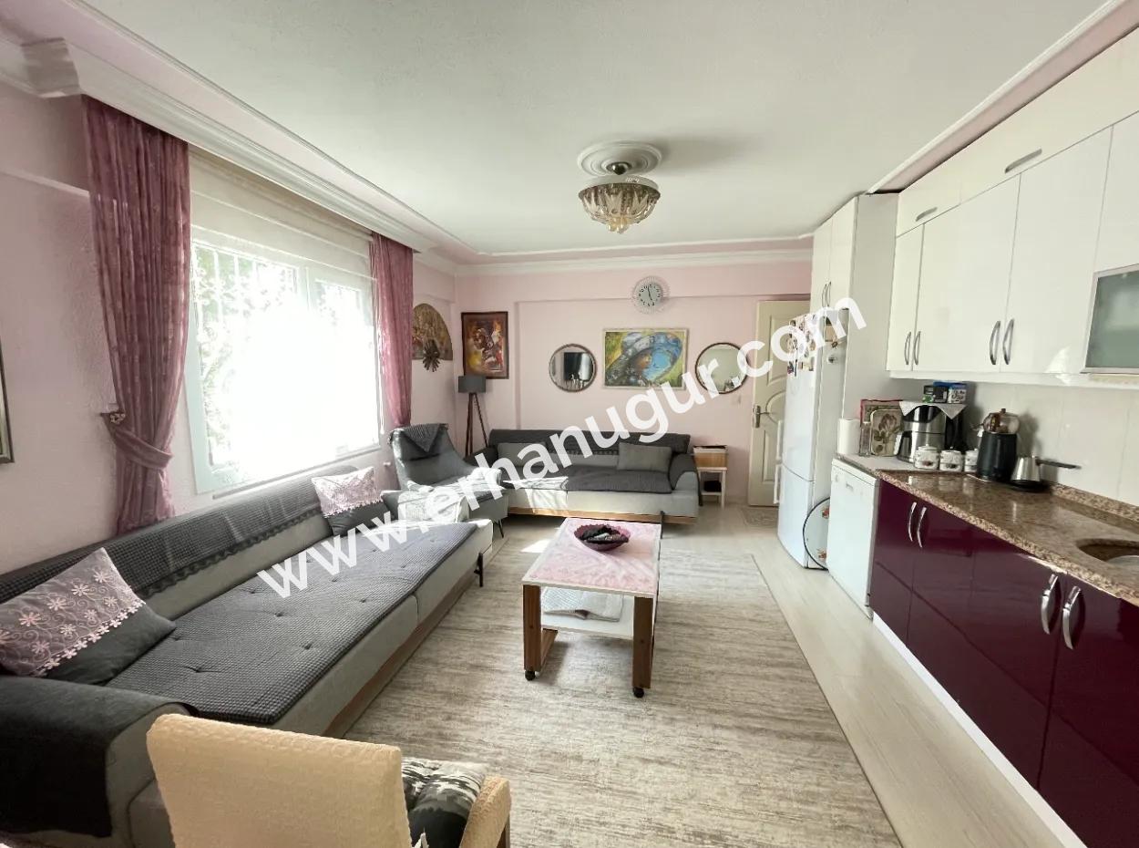 2 1 Apartment For Sale In Ürkmez With 350Mt Garden To The Sea In The Center