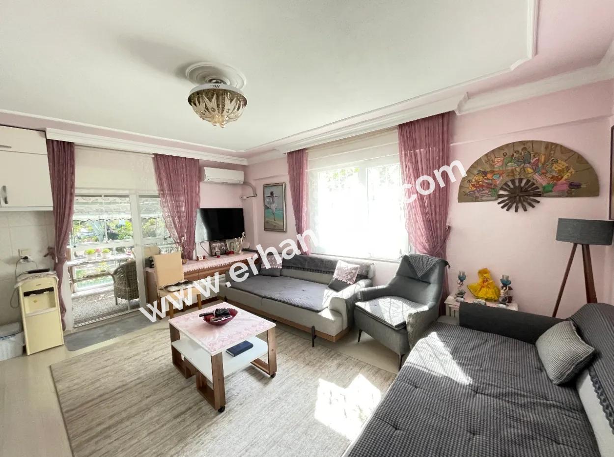 2 1 Apartment For Sale In Ürkmez With 350Mt Garden To The Sea In The Center