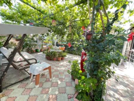 2 1 Apartment For Sale In Ürkmez With 350Mt Garden To The Sea In The Center