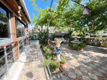 2 1 Apartment For Sale In Ürkmez With 350Mt Garden To The Sea In The Center