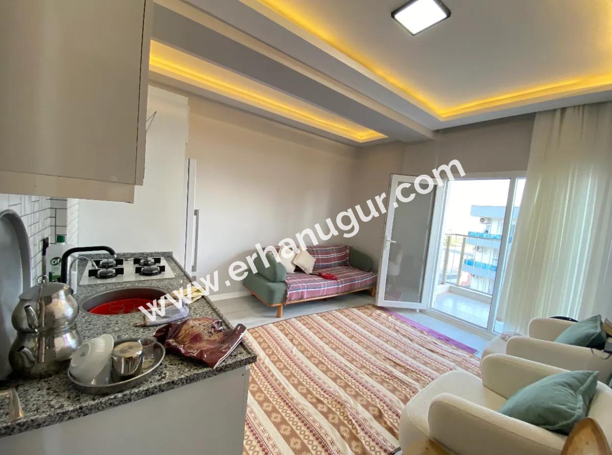 Gümüldür De Full Eşyalı Full Deniz Asansörlüdür Satılık 1+1 Daire