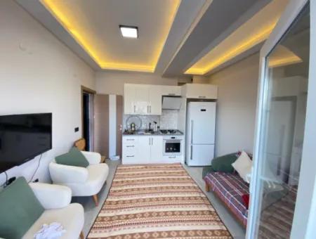 Gümüldür De Full Eşyalı Full Deniz Asansörlüdür Satılık 1+1 Daire