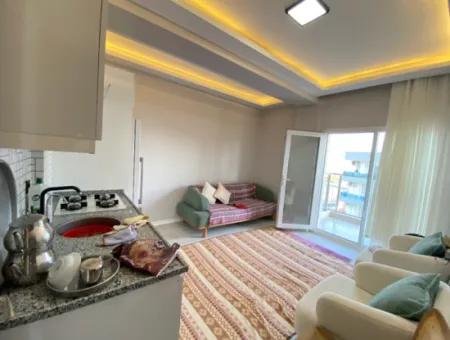 Gümüldür De Full Eşyalı Full Deniz Asansörlüdür Satılık 1+1 Daire